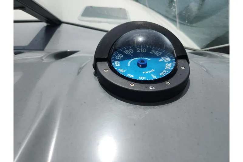 Slide: The Image of Compass on 2003 Tiara Yachts 3100 Open LE dashboard, displaying navigation directions. - 23
