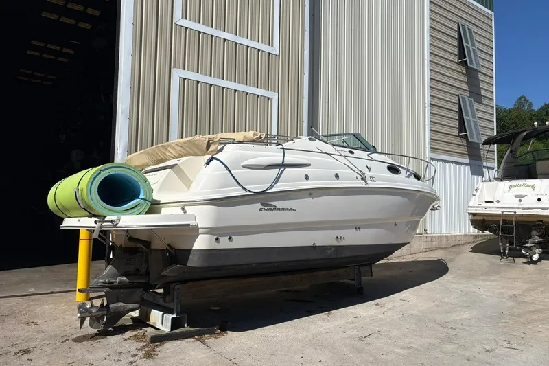 Slide: The Image of 2002 Chaparral Signature 260 boat parked outside a storage facility. - 5