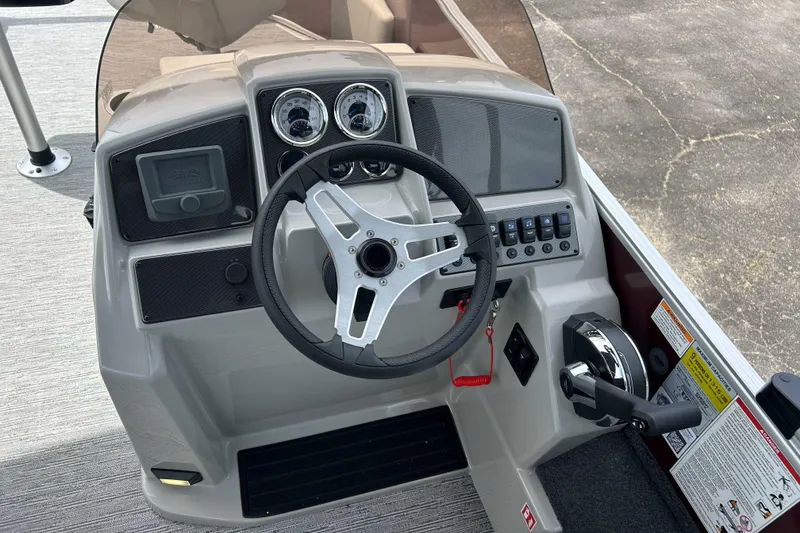 Slide: The Image of Steering console of 2026 Starcraft EX 20 F boat with gauges and controls. - 3