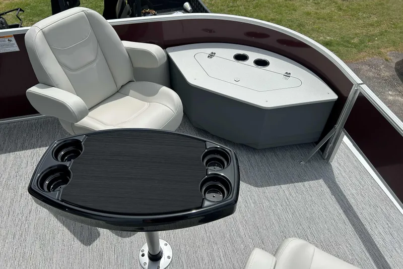 Slide: The Image of 2026 Starcraft EX 20 F boat interior with comfortable seating and cup holders. - 6