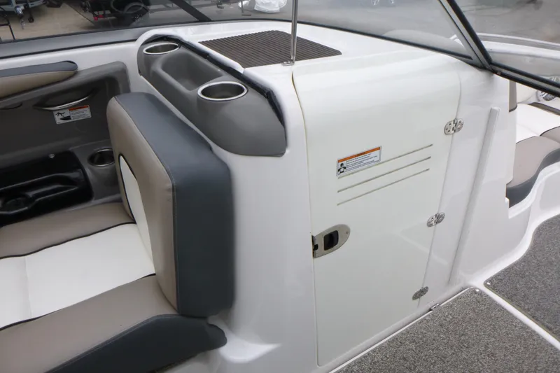 Slide: The Image of Interior view of a 2011 Yamaha Boats 242 Limited S, featuring seating and storage compartments. - 9