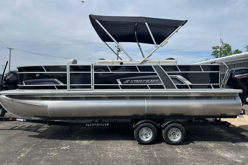 The Image of 2026 Starcraft EX 22 FD pontoon boat with canopy on trailer. - 0