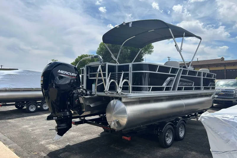 Slide: The Image of 2026 Starcraft EX 22 FD pontoon boat with Mercury outboard motor on trailer. - 12
