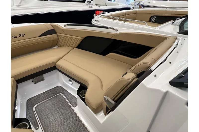 Slide: The Image of Interior of Sea Ray SLX 260 boat, 2025 model, featuring beige upholstery. - 15