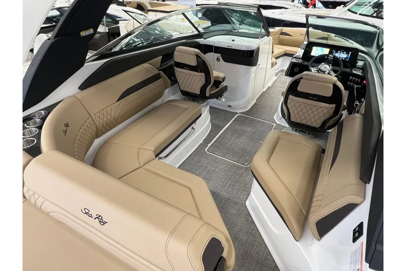 Slide: The Image of Interior of 2025 Sea Ray SLX 260 yacht with luxurious seating. - 5