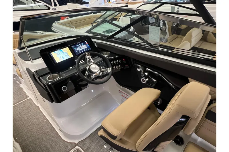 Slide: The Image of Interior of 2025 Sea Ray SLX 260 boat featuring modern cockpit. - 9