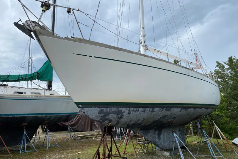 Slide: The Image of Sailboat on stands, Fuji 40 model from 1979, with cloudy sky background. - 15