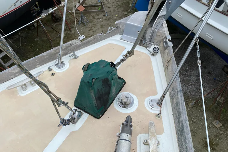 Slide: The Image of Deck of a 1979 Fuji 40 sailboat with anchor chain and fittings. - 21