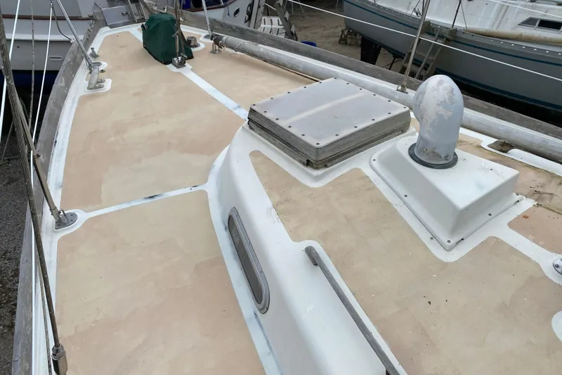 Slide: The Image of Deck of a 1979 Fuji 40 sailboat with hatches and fittings. - 28