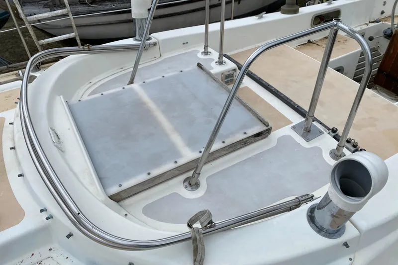 Slide: The Image of Deck of a 1979 Fuji 40 sailboat with stainless steel railings and fittings. - 29