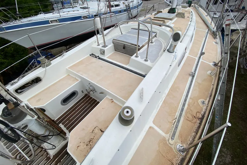 Slide: The Image of 1979 Fuji 40 sailboat deck with clean lines and spacious layout. - 35