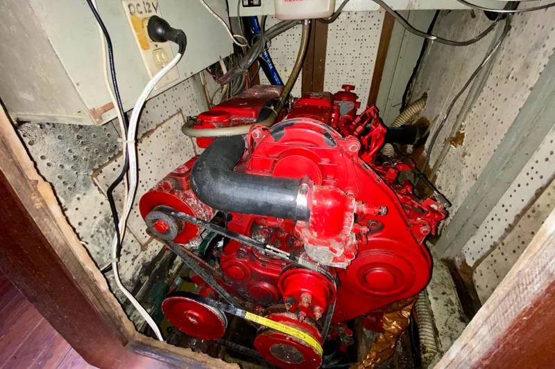 Slide: The Image of Red engine in a confined space, Fuji 40 model, 1979, with visible wiring and components. - 58