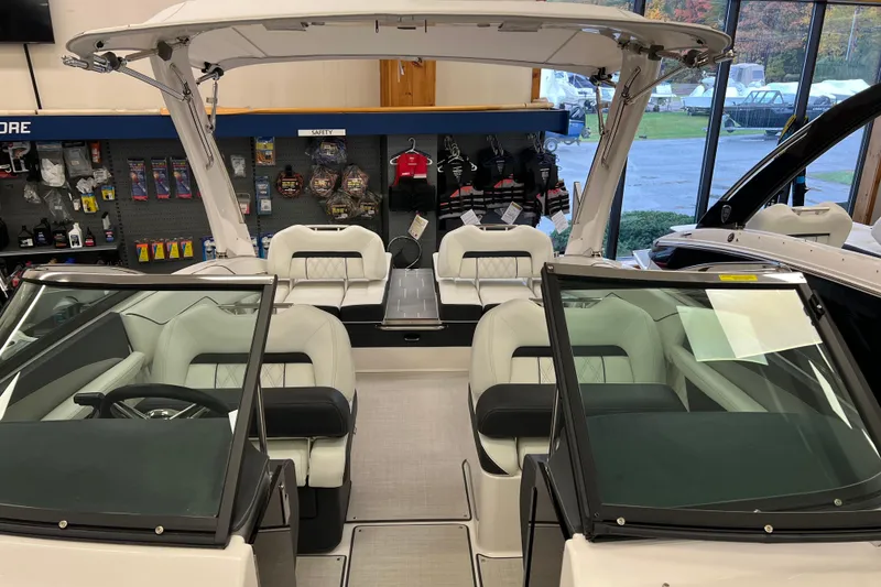 Slide: The Image of Interior view of a 2025 Regal LS4 boat with luxurious seating and modern design. - 14