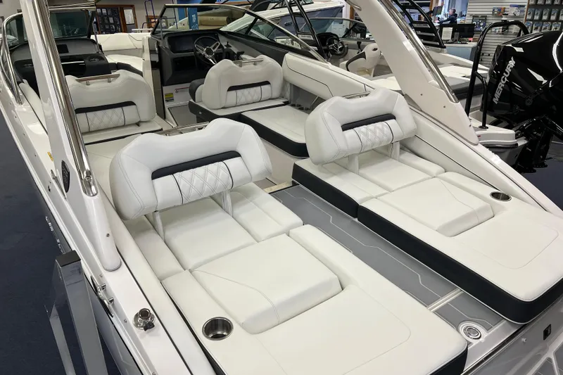 Slide: The Image of Luxurious 2025 Regal LS4 boat interior with plush white seating and modern design. - 2