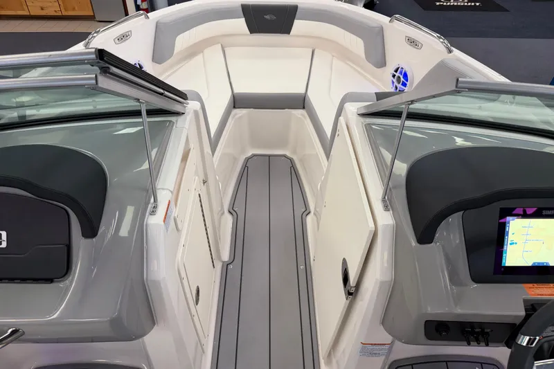 Slide: The Image of 2025 Chaparral 21 SSi OB boat interior with modern dashboard and seating. - 16