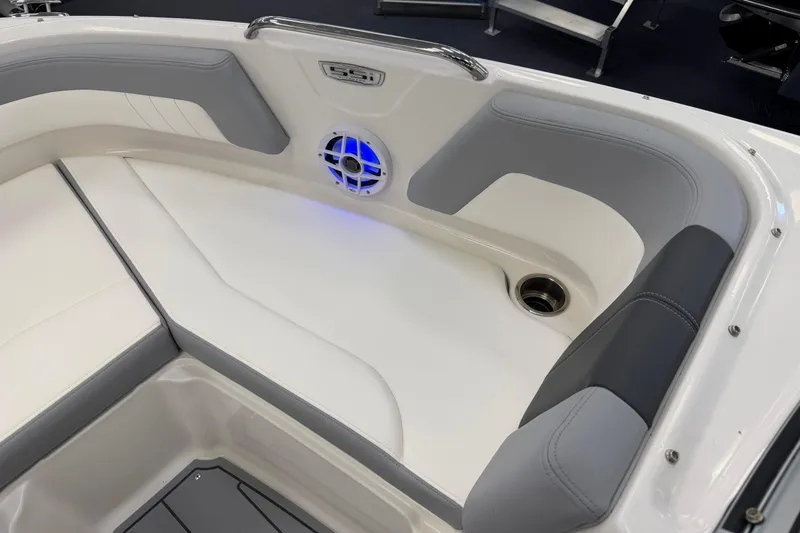 Slide: The Image of Interior of 2025 Chaparral 21 SSi OB boat with cushioned seating and speaker. - 20