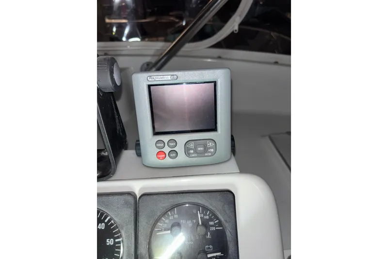 Slide: The Image of Raymarine ST70 display on 1995 Luhrs 29 Open boat dashboard with gauges. - 22
