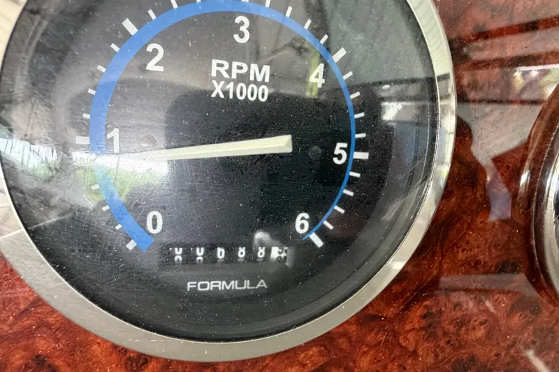 Slide: The Image of Close-up of a 2005 Formula 330 Sun Sport RPM gauge. - 17