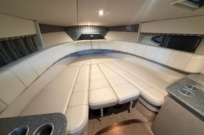 Slide: The Image of Luxurious interior of a 2005 Formula 330 Sun Sport boat with plush seating. - 23