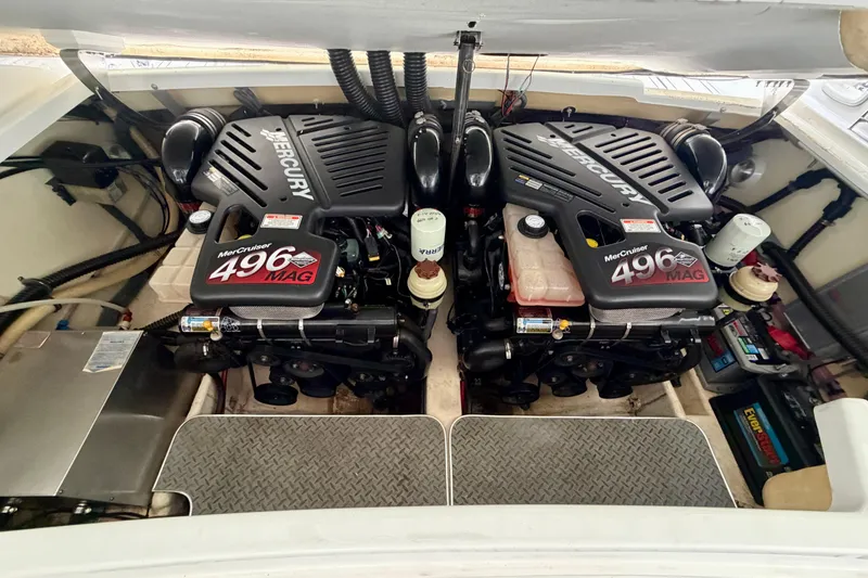 Slide: The Image of Twin MerCruiser 496 MAG engines in a 2005 Formula 330 Sun Sport boat. - 31