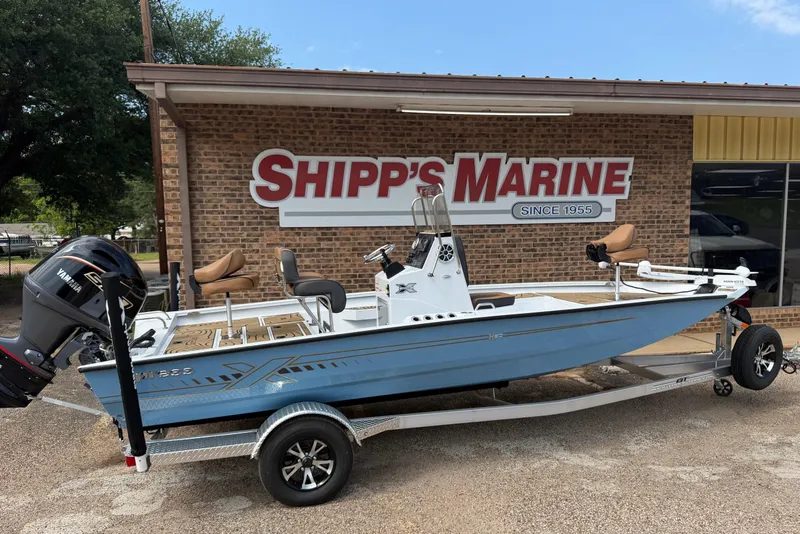 The Image of 2026 Xpress H20B Bay boat on trailer at Shipp's Marine dealership. - 1