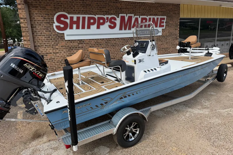 Slide: The Image of 2026 Xpress H20B Bay boat with Yamaha engine at Shipp's Marine dealership. - 5