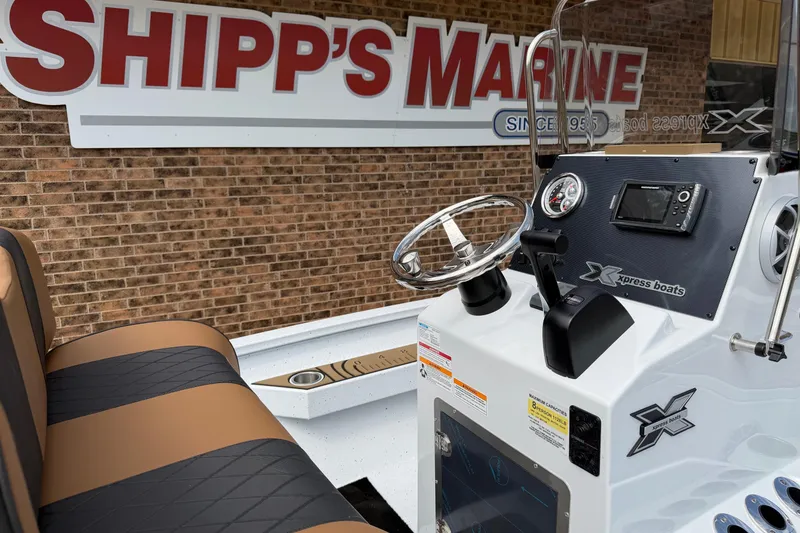 Slide: The Image of 2026 Xpress H20B Bay boat interior with steering wheel and dashboard at Shipp's Marine. - 7