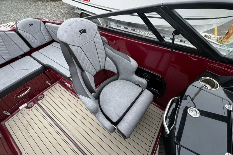 Slide: The Image of Luxury interior of 2026 Stingray 23 OCX boat with plush seating and sleek design. - 29