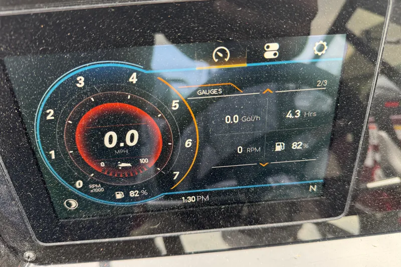 Slide: The Image of Digital dashboard of 2026 Stingray 23 OCX displaying speed, fuel, and engine metrics. - 7