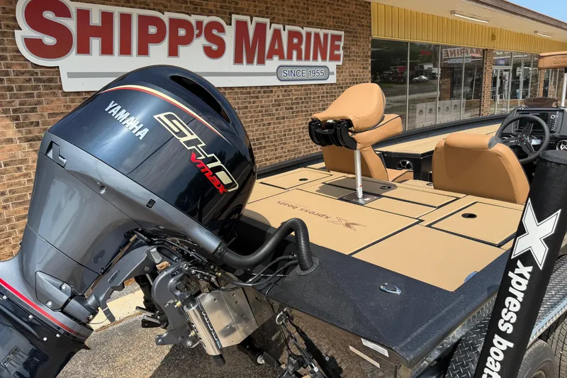 Slide: The Image of Xpress H20 boat with Yamaha engine at Shipp's Marine, 2026 model. - 6