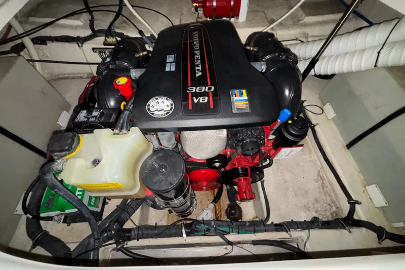 Slide: The Image of Engine compartment of a 2014 Rinker 290 Express Cruiser with Volvo Penta 380 V8 engine. - 28