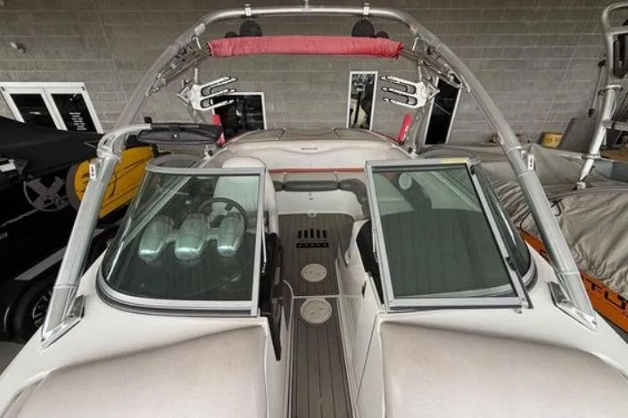 Slide: The Image of 2005 MasterCraft XStar boat interior with open windshield and wakeboard tower. - 4
