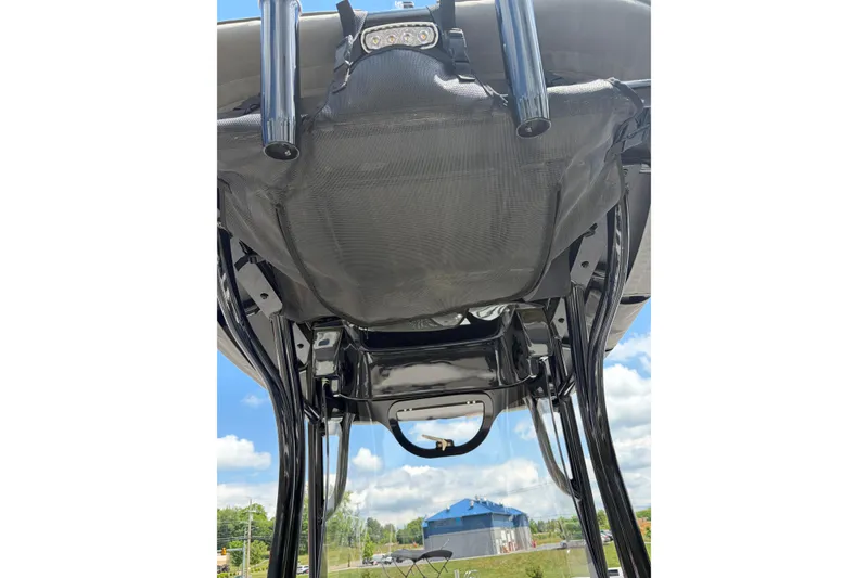 Slide: The Image of Underside view of 2026 Crownline 210 CC Finseeker boat canopy. - 11
