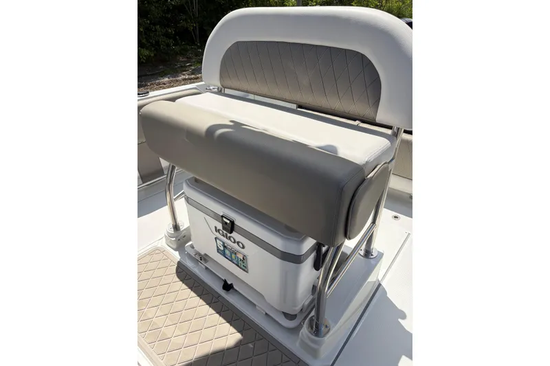 Slide: The Image of Crownline 210 CC Finseeker 2026 boat seat with integrated Igloo cooler. - 9