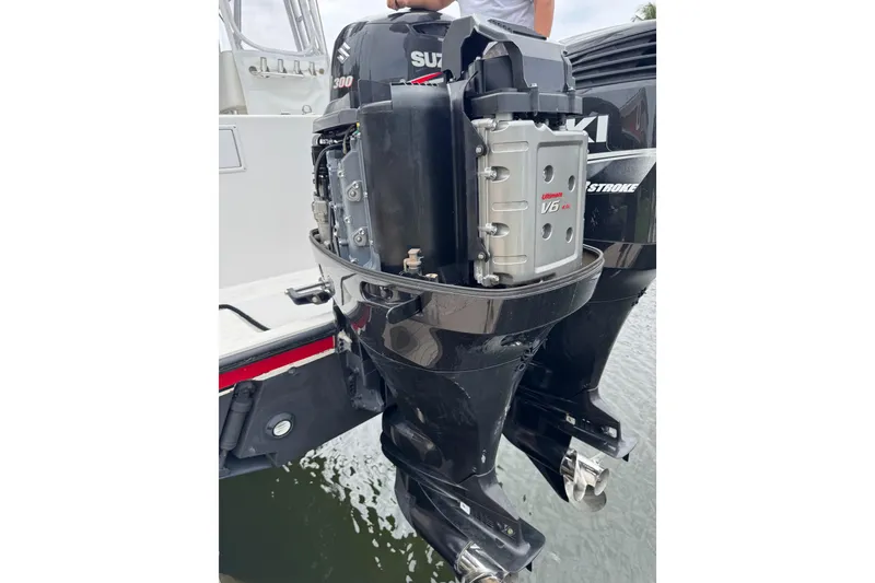 Slide: The Image of Outboard motor on 2008 Contender 35 Express Side Console boat, Suzuki 300 horsepower. - 18