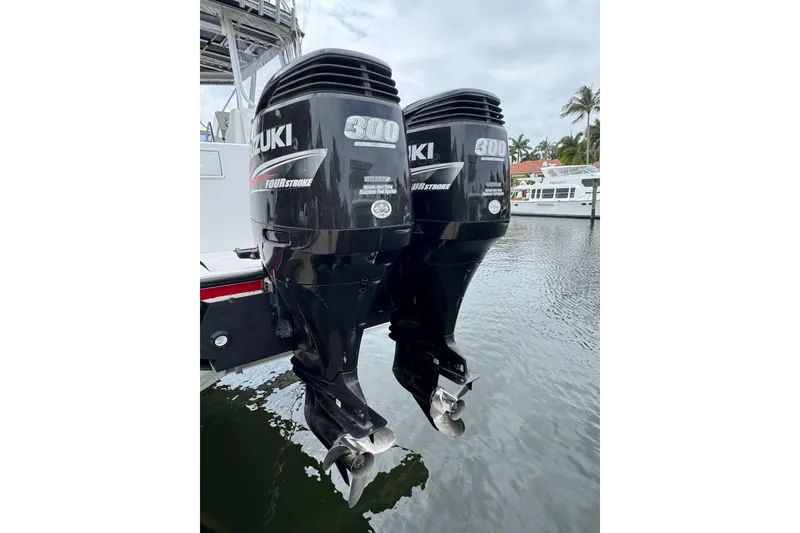 Slide: The Image of Twin Suzuki 300 outboard engines on a 2008 Contender 35 Express Side Console boat. - 6