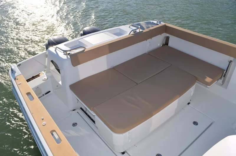 Slide: The Image of Manufacturer Provided Image: 2017 Jeanneau Merry Fisher 855 Marlin boat with cushioned seating on deck. - 16