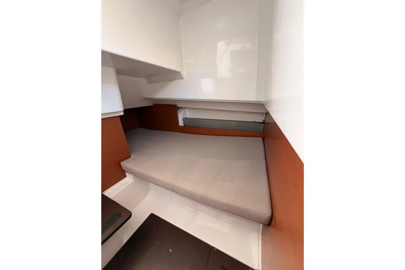 Slide: The Image of Interior cabin of 2017 Jeanneau Merry Fisher 855 Marlin, featuring a cozy sleeping area. - 36