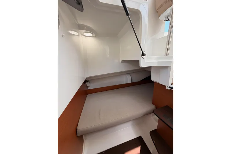 Slide: The Image of Interior cabin of 2017 Jeanneau Merry Fisher 855 Marlin boat, featuring a cozy sleeping area. - 38