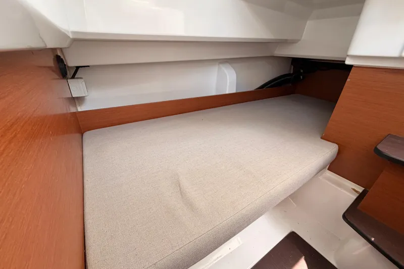 Slide: The Image of Interior cabin view of 2017 Jeanneau Merry Fisher 855 Marlin with cushioned berth. - 39