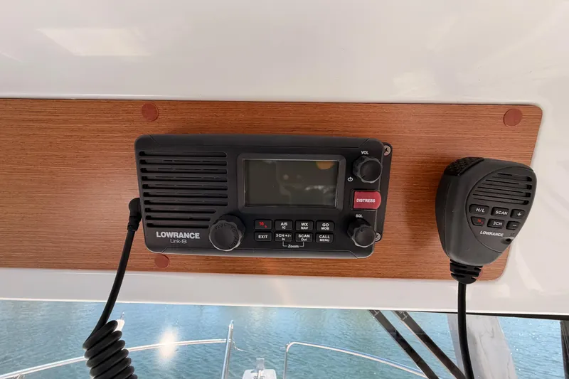 Slide: The Image of Lowrance Link-8 radio on 2017 Jeanneau Merry Fisher 855 Marlin boat dashboard. - 51