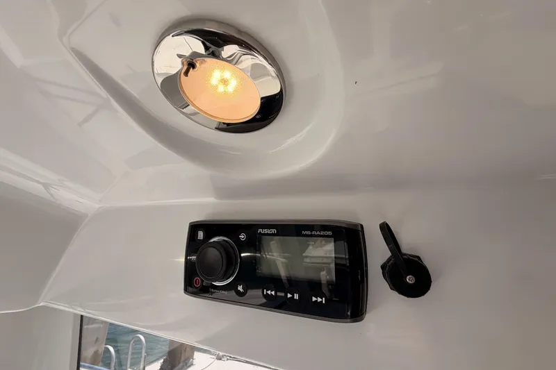Slide: The Image of Interior of 2017 Jeanneau Merry Fisher 855 Marlin with Fusion MS-RA205 stereo system. - 52