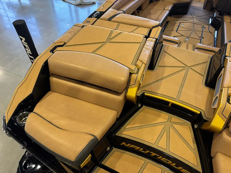 Slide: The Image of Interior of 2025 Nautique Super Air Nautique G25 Paragon, luxurious seating. - 10