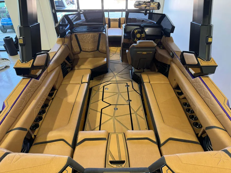 Slide: The Image of Interior of 2025 Nautique Super Air Nautique G25 Paragon with luxurious seating. - 14