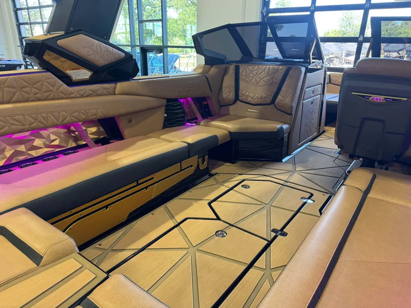 Slide: The Image of Luxurious interior of the 2025 Nautique Super Air Nautique G25 Paragon. - 16