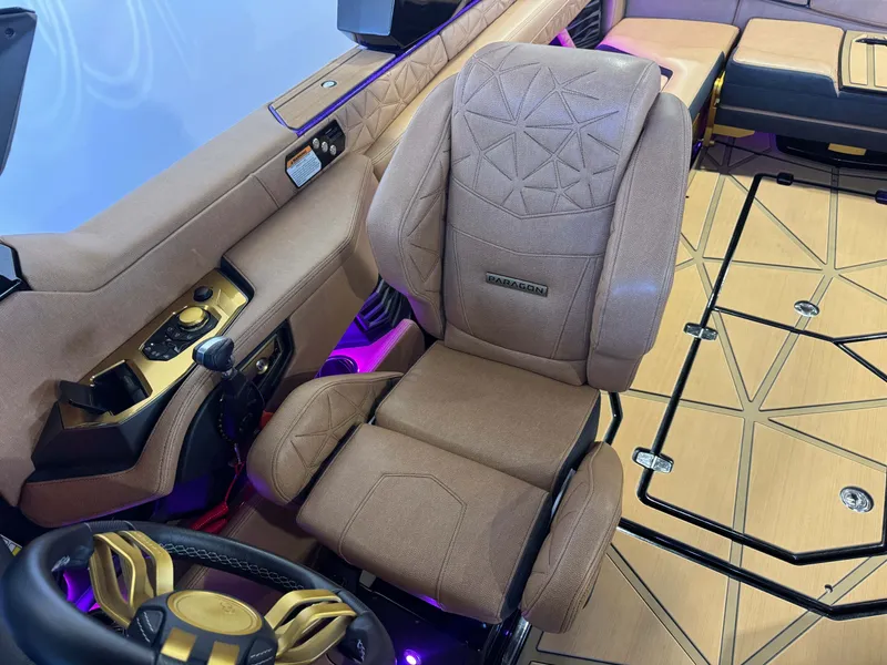 Slide: The Image of Luxurious interior of the 2025 Nautique Super Air Nautique G25 Paragon. - 23