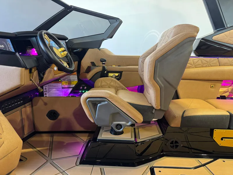 Slide: The Image of Interior of 2025 Nautique Super Air Nautique G25 Paragon with luxurious seating. - 25