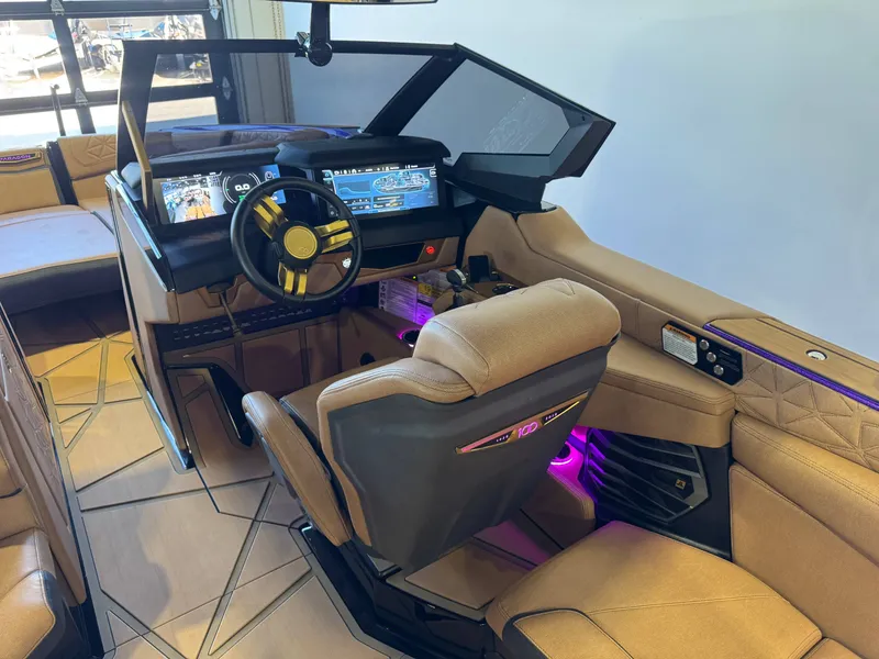 Slide: The Image of Interior of 2025 Nautique Super Air Nautique G25 Paragon with modern cockpit. - 26