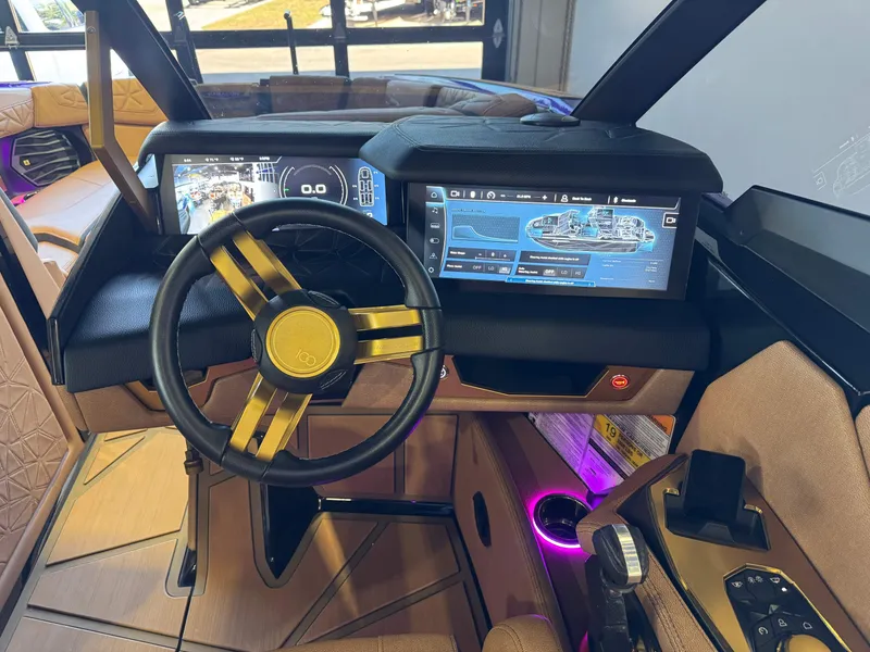 Slide: The Image of Interior of 2025 Nautique Super Air Nautique G25 Paragon with modern dashboard. - 28