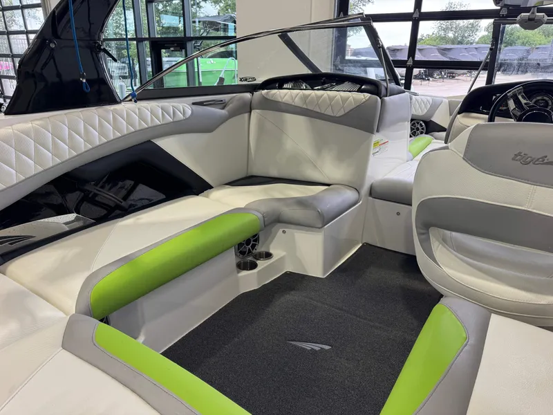 Slide: The Image of Interior of a 2014 Tigé Z1 boat with modern seating. - 13